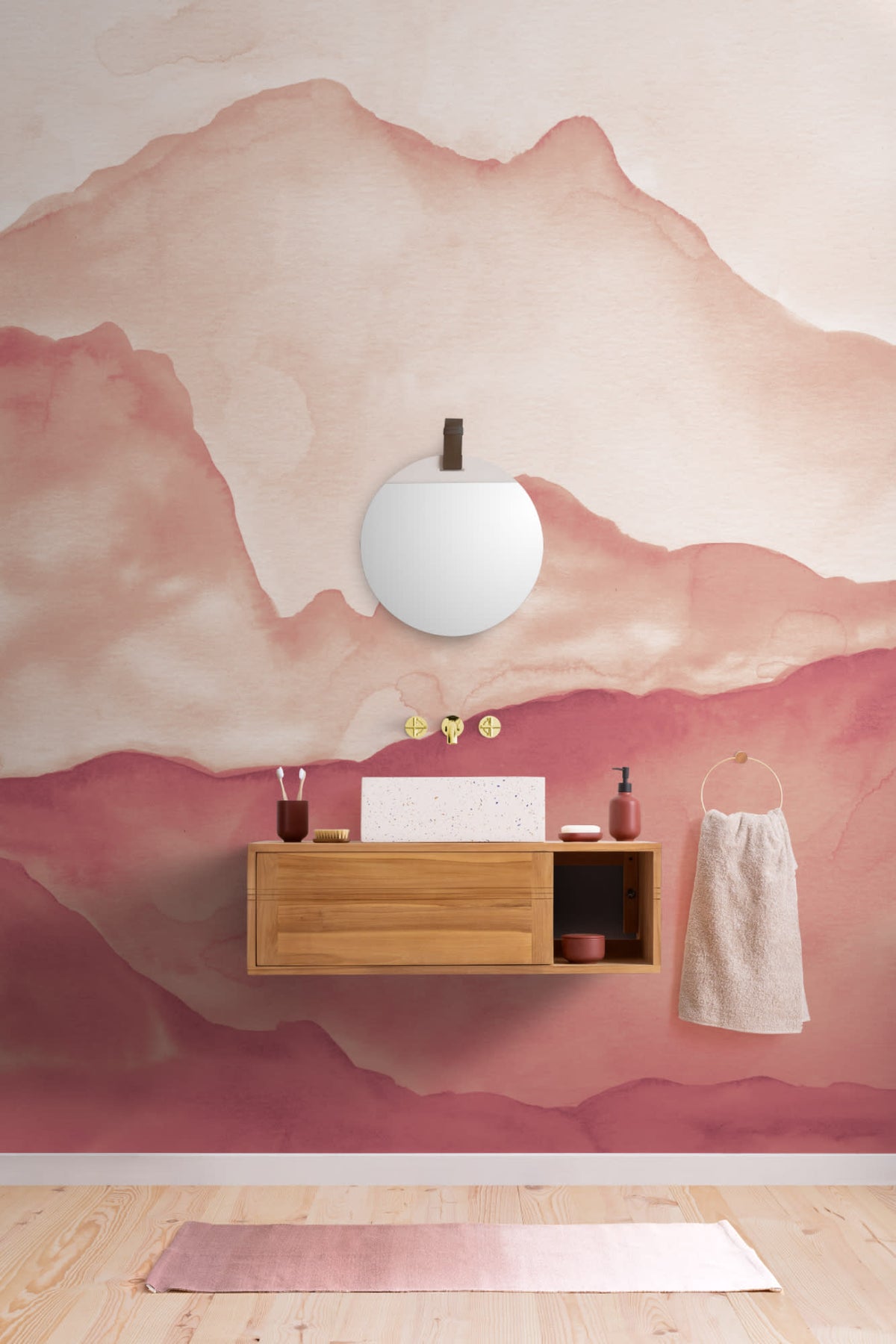 The Sunset Escarpment mural in burnt orange in a bathroom