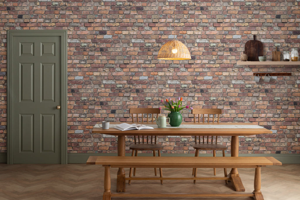 The Terrace Brickwork mural in umber brown behind a dining table