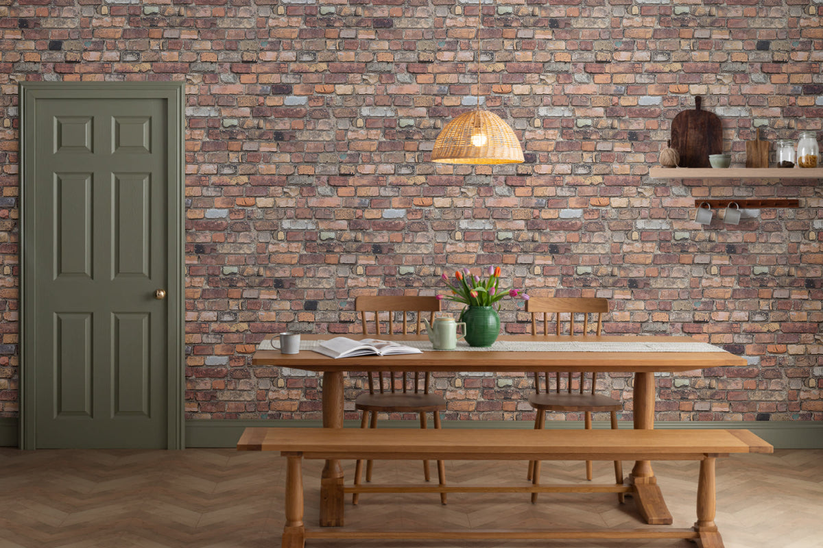 The Terrace Brickwork mural in umber brown behind a dining table