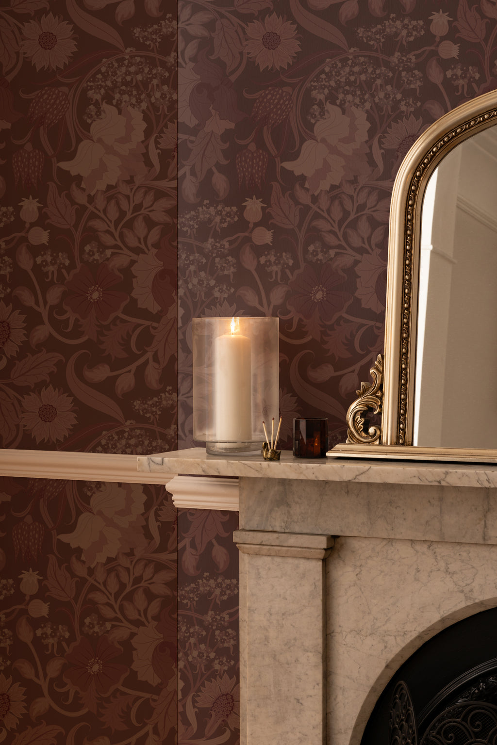 The Thistle Manor wallpaper in mulberry plum in a living room