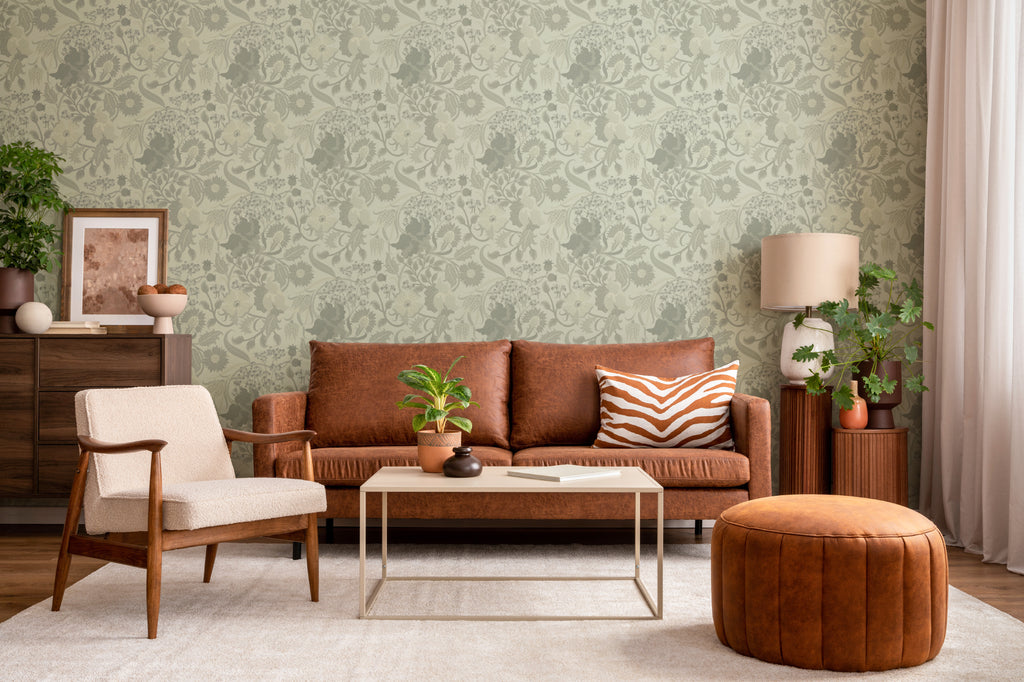 The Thistle Manor wallpaper in sage green in a living room
