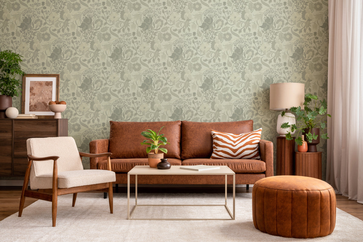 The Thistle Manor wallpaper in sage green in a living room