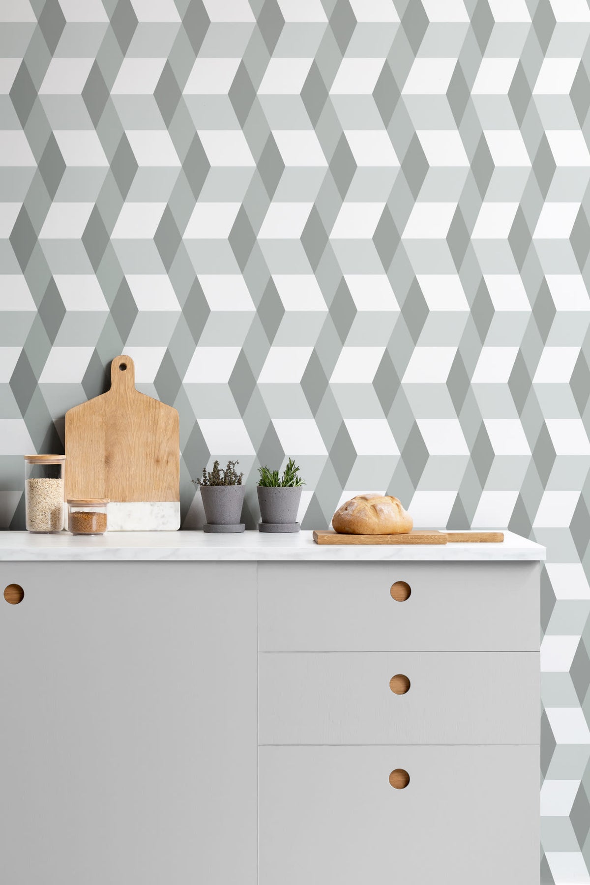 The Tumbling Block wallpaper in sage grey in a kitchen