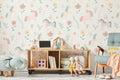 The Unicorn Garden wallpaper in soft pastel on a nursery wall