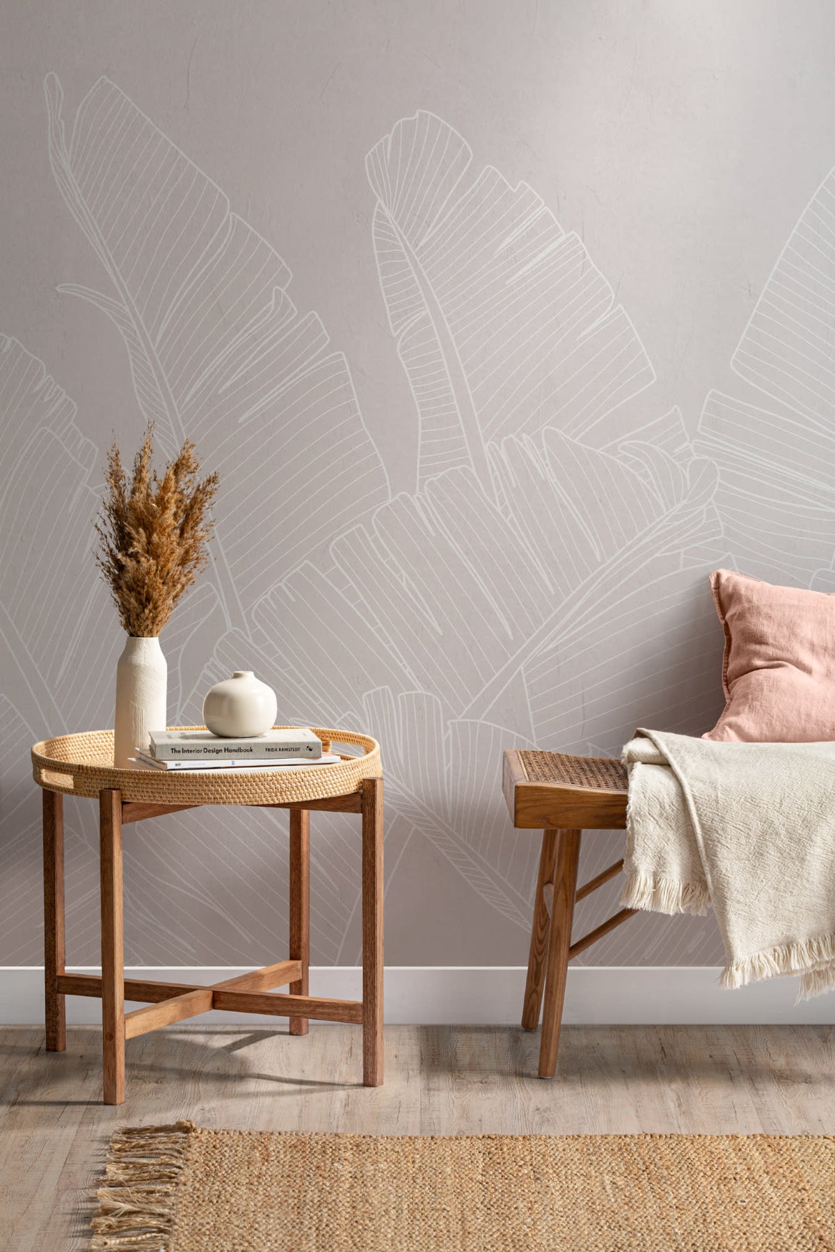 The Whisper Leaf mural in pale oat behind a desk in a home office